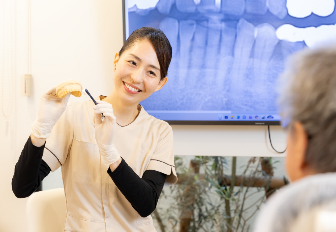 歯磨きをする女性